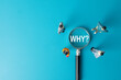 © Pakorn - Root cause analysis and problem-solving concept. A team of miniature people looks at the question 'WHY?' under a magnifying glass, symbolizing investigation, teamwork,brainstorming, critical thinking.