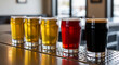 © Mirivox - A row of glass of different color liquid, a gold, a red and a black color beverage, show tasting option, representing refreshment, leisure, cheers, drinking