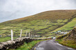 © RooM The Agency - Narrow country road through the countryside on an overcast day, Dingle Peninsula, County Kerry, Ireland