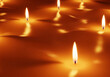 © Arphakon - A soft glowing candle light background in cinematic style, perfect for warm spooky atmospheres and Halloween, Ai Generate.