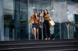 © Parichat - Happy young asian women shopping, walking down city stairs