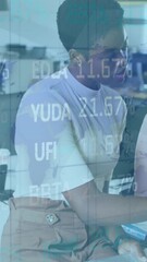 Wall Mural - Animation of statistics and financial data processing over diverse businesswomen in office