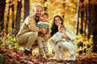 © Louis-Paul Photo - Beautiful young family on a walk in autumn forest