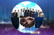 © New Africa - Partners shaking hands in front of business people in globe against blurred background