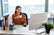 © Home-stock - Focused businesswoman holding cup in hands, working with computer in office, woman ceo sitting at workplace