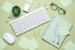 © Pixel-Shot - Composition with keyboard, sunglasses, stationery and houseplant on green background