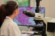 © ultramansk - A biomedical researcher uses an AI-powered platform to analyze complex genomic data, identifying a novel biomarker for personalized medicine and accelerating future drug discovery.