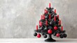 © Irina B - Elegant gothic christmas tree with black and red ornaments for unique holiday decoration and festive atmosphere