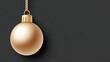 © Irina B - Minimalist golden christmas bauble with metallic gloss on black background for holiday decor and design