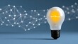 © Nataliia_Trushchenko - A light bulb is lit up on a blue background. The light bulb is surrounded by a lot of lines and dots, giving the impression of a complex web of connections. Concept of innovation and creativity