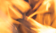 © Tomasz - Abstract open flames background with soft motion blur in warm orange and yellow tones, burning fire texture with copy space. Heat, energy, house fire danger warning concepts, blazing flame backdrop