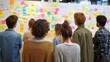 © medalinebow - Back View of Students Engaged in Collaborative Brainstorming Session with Colorful Sticky Notes