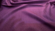 © zaid - Purple fabric with a subtle shimmer and a smooth, flowing texture and sheen
