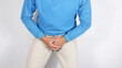 © PANCASONA CREATION - Man hand holding on middle crotch, Concept of Prostatitis,Penis Cancer,Testicular Tumor, young man holding his crotch,problem of genitourinary,asian male patient with Prostate cancer ,illness health