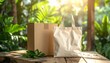 © andre - Eco-Friendly Packaging Cardboard Box and Tote Bag with Greenery