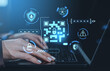 © ImageFlow - Cybersecurity interface with QR code and digital security icons on laptop screen background showing password protection and secure data access concept.