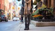 © Sami - Woman in a stylish outfit with a scarf and combat boots stands on a city street, surrounded by urban life.