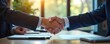© chaiwat - Confident handshake across a modern office desk during a job interview, signifying a successful meeting and potential new hire ,  suit,  employer,  partnership