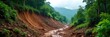 © Chanchai - A lush rainforest devastated by a mudslide, trees uprooted and debris scattered across the landscape The aftermath of a powerful natural disaster is evident in the destruction , erosion, debris