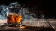 © Babb - A whiskey glass filled with ice sits on a rustic wooden table. Wisps of smoke curl around the glass in a softly lit space creating a warm and inviting atmosphere.