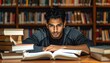© Aldi - Focused Young Man Studying in Library
