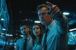 © whitestorm - Focused Team in a High-Tech Control Room Analyzing Data on Large Screens