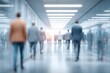 © whitestorm - Dynamic motion of blurred figures in a modern business corridor, bright light