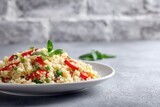 Plate of couscous salad with fresh herbs