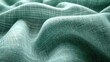 © afif - Teal linen fabric texture close-up