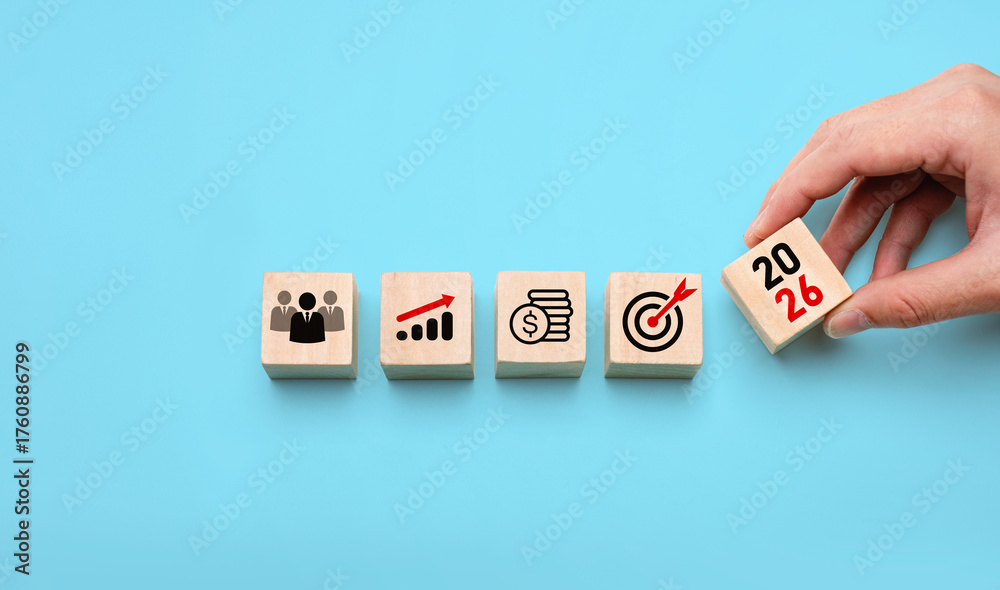 2026 business strategy planning concept with hand placing wooden blocks ...