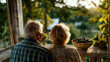 © ABF_MATEO - Elderly couple sits on porch, watching the sunset. Enjoying life's simple moments. A picture of peaceful retirement, enjoying the evening.