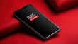 © nameera_juwairiya - black friday sale smartphone red background