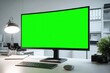 © Marina Demidiuk - Blank Green Screen Open Laptop. Laptop computer on blur office background. Front View Modern Monitor. Mockup for text. Device display mock-up template for keying. Planning, search, tech. Chrome key