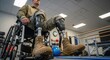 © MMerellinn - Military personnel recovering with advanced prosthetic limbs in a rehabilitation center, showcasing resilience and modern medical aid.