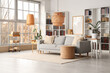 © Pixel-Shot - Interior of living room with sofa, table and book shelves near white wall