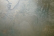 © Hary - Abstract textured background of oily river water surface.Ecology and environmental concept. Water pollution. For graphic design, banners and 3D rendering