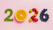 © Nim9ty  Pics - Happy new year 2026 resolution with healthy food. creative diet plan with fruit and vegetable for sustainable weight loss and wellness