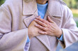 © Liubomir - Senior woman feeling chest pain, having heart attack