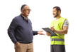 © Ljupco Smokovski - Mature man talking to a worker in a reflective vest