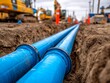 © Oleg - Construction site with blue pipes installed in a trench during overcast weather