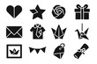 © Olha - Decorative Origami Icons. Solid style icons of Decorative origami and gifts: folded heart, lucky star, origami rose, gift box,