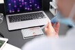 © New Africa - Research in genetics. Scientist with micropipette and microplate working at table in laboratory, closeup