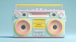 © Jojo* - Brightly colored portable stereo music player rests against a light blue background