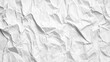 © NeuralStudio - This image shows a close-up view of crumpled white paper, featuring various textures and shadows that add depth to the simple yet creative background.