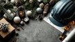 © syhin_stas - Construction professional preparing festive workspace with Christmas ornaments, wrapped presents, pine branches, blueprint, measuring tools, hard hat on gray background