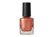 © PerfectPhoto - Shimmering copper nail polish bottle on transparent background