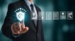 © Royal studio - Man in suit touching a shield icon with a checkmark, signifying security, quality assurance and compliance with business standards
