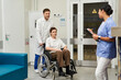 © LIGHTFIELD STUDIOS - Healthcare team preparing a patient for procedure in a modern hospital setting