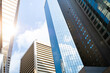 © xy - Low angle view of modern office buildings