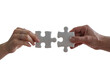 © Transparent PNG  - Hands connecting two white jigsaw puzzle pieces for a teamwork solution isolated on transparent white background